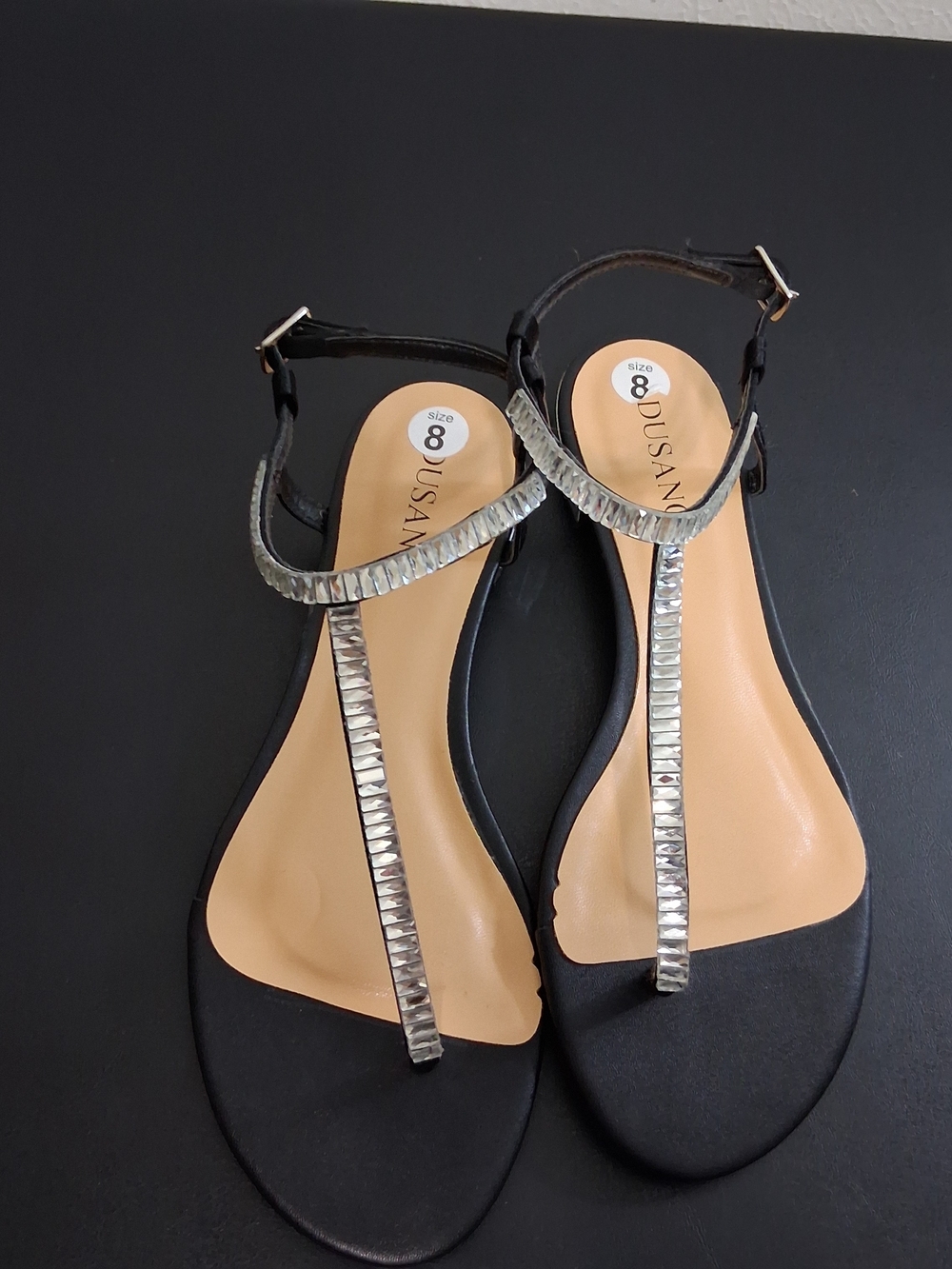 Black T-Strap Sandals with Silver Accents